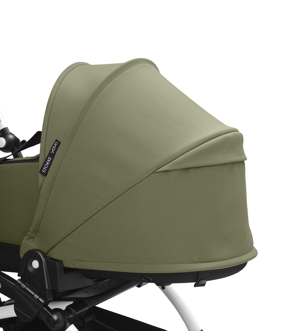 Stokke® YOYO3® Newborn Shell, Olive. White Frame. Canopy ventilation closed. Close-up.
 galery image 6